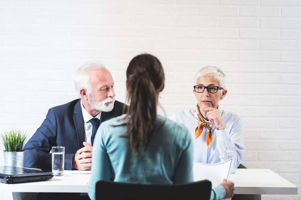 A couple from the Boomer generation meets with an attorney to discuss their estate plan. 